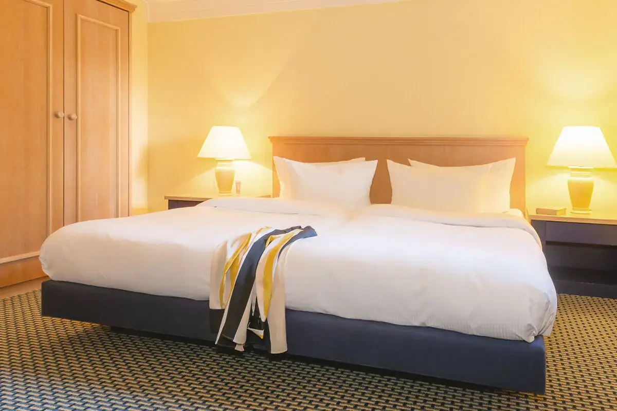 Gemütliches Schlafzimmer im Ferienhaus Kastanie, Sporthotel Grafenwald