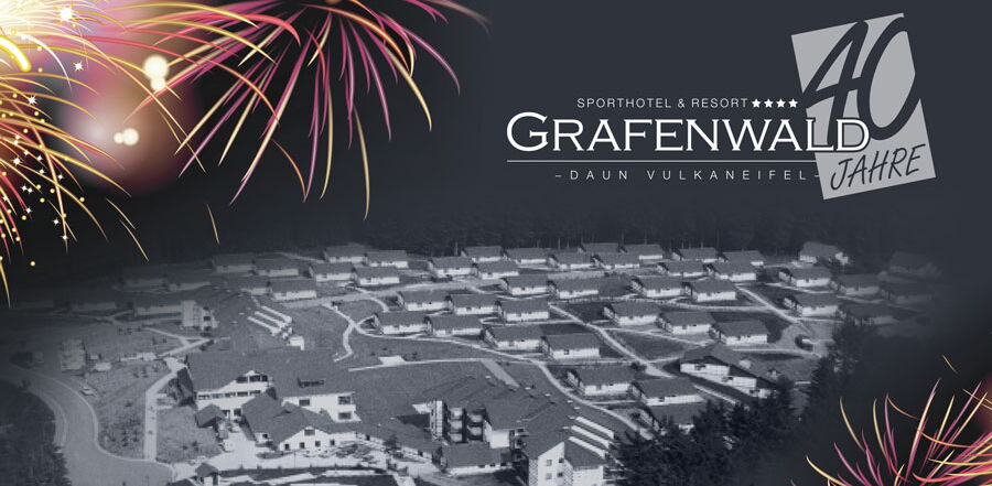 Jubiläumsartwork mit Feuerwerk, Blick über den Ferienpark und 40 Jahre Grafenwald Logo
